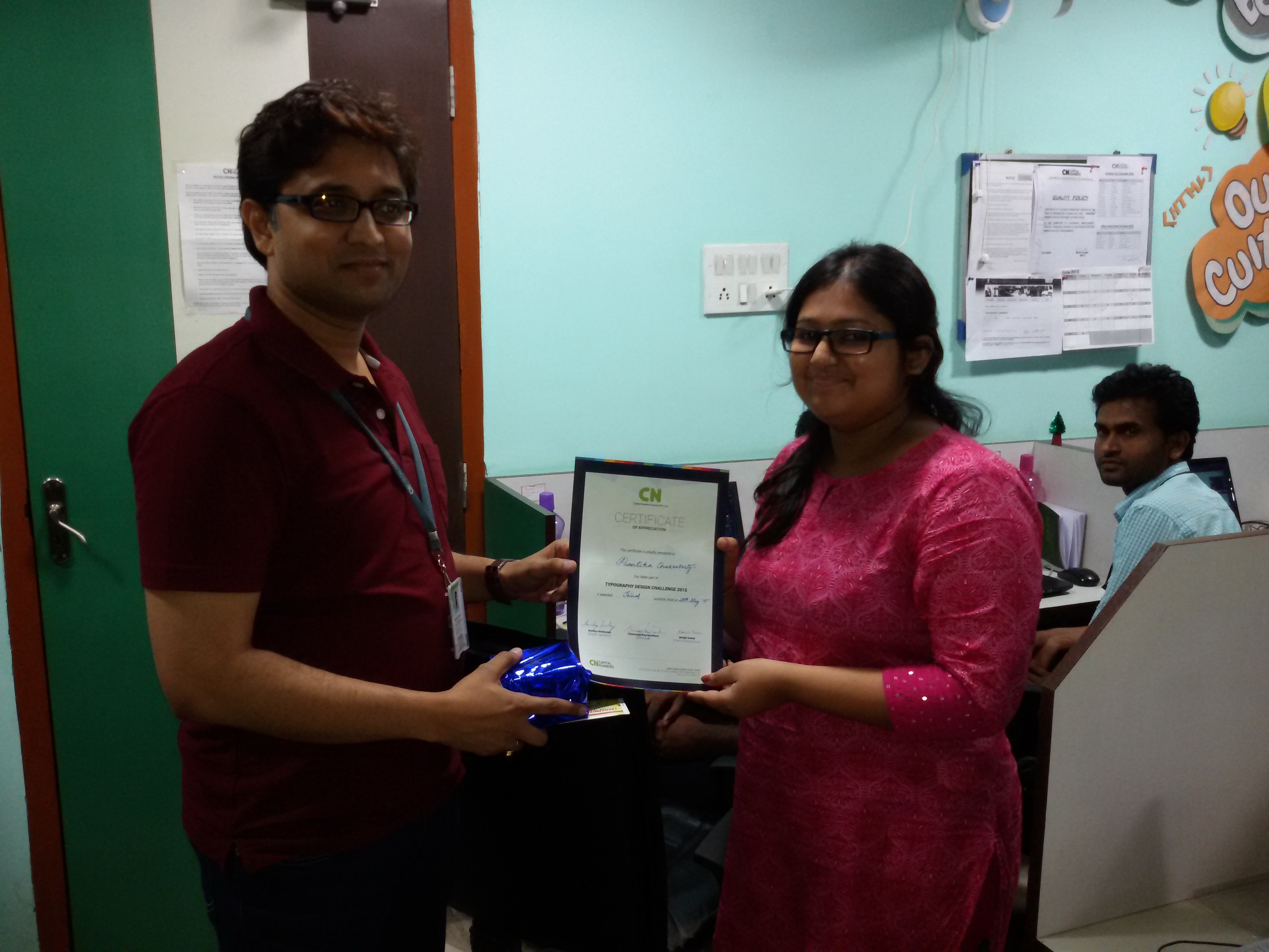 Prantika Chakraborty receiving 3rd Prize from Anindya Mukherjee