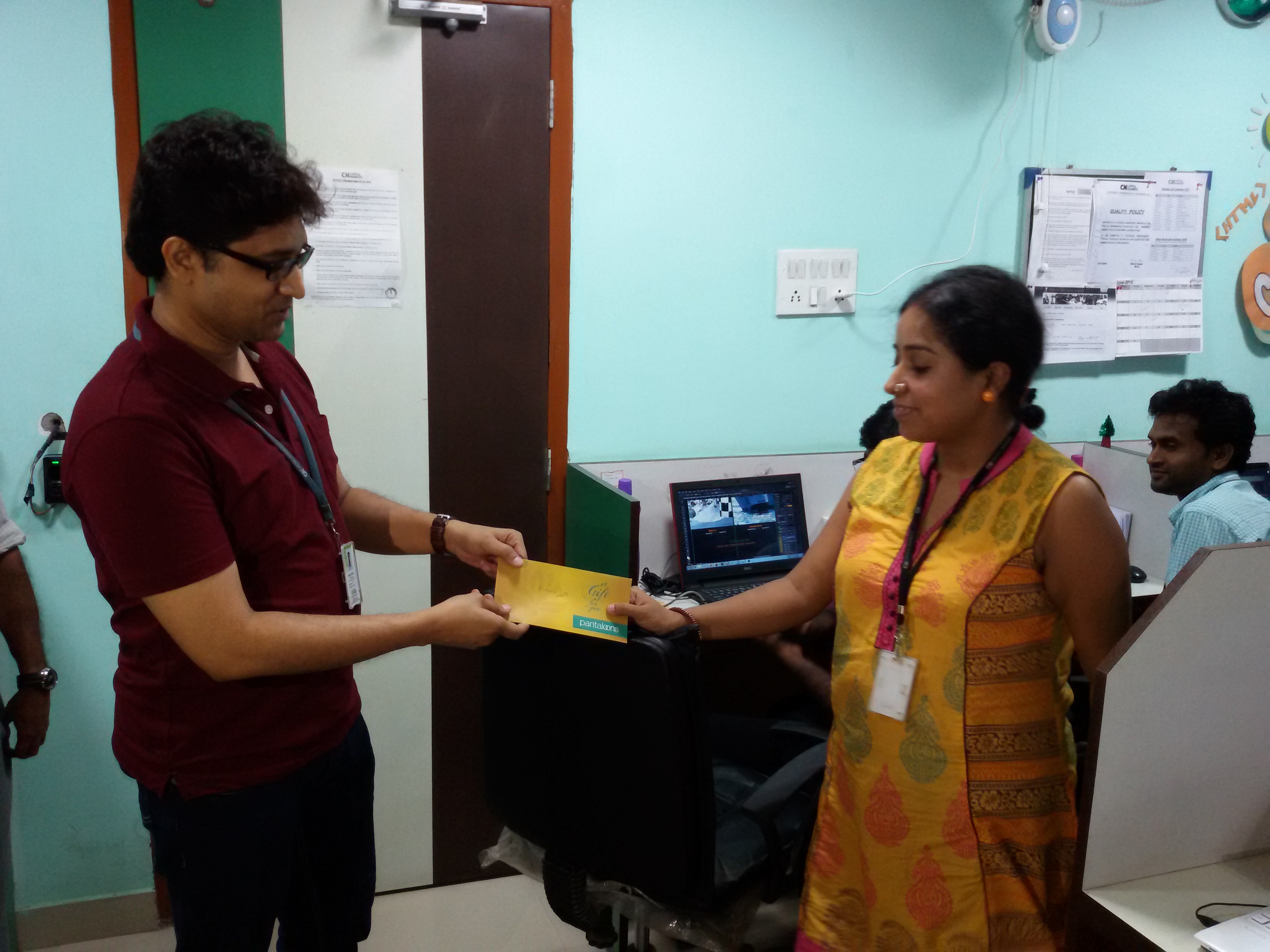 Priyaka Deb receiving 1st Prize from Anindya Mukherjee