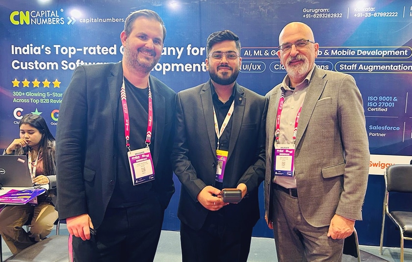 Global tech leaders visiting the Capital Numbers booth